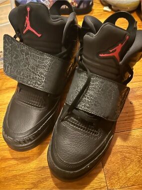 Jordan Kids Black Sneakers with Red Jumpman Accents